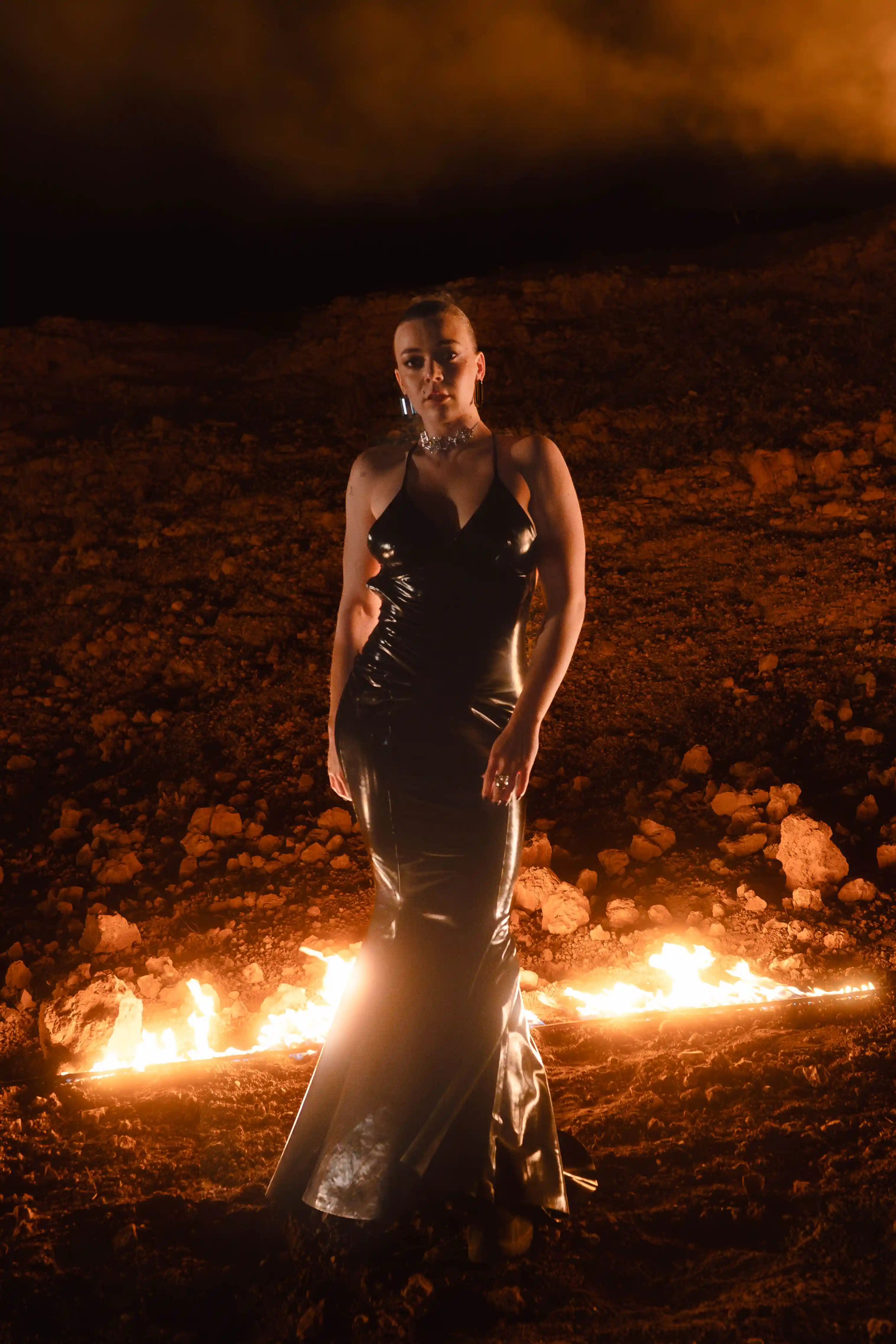 Becky stood infront of fire