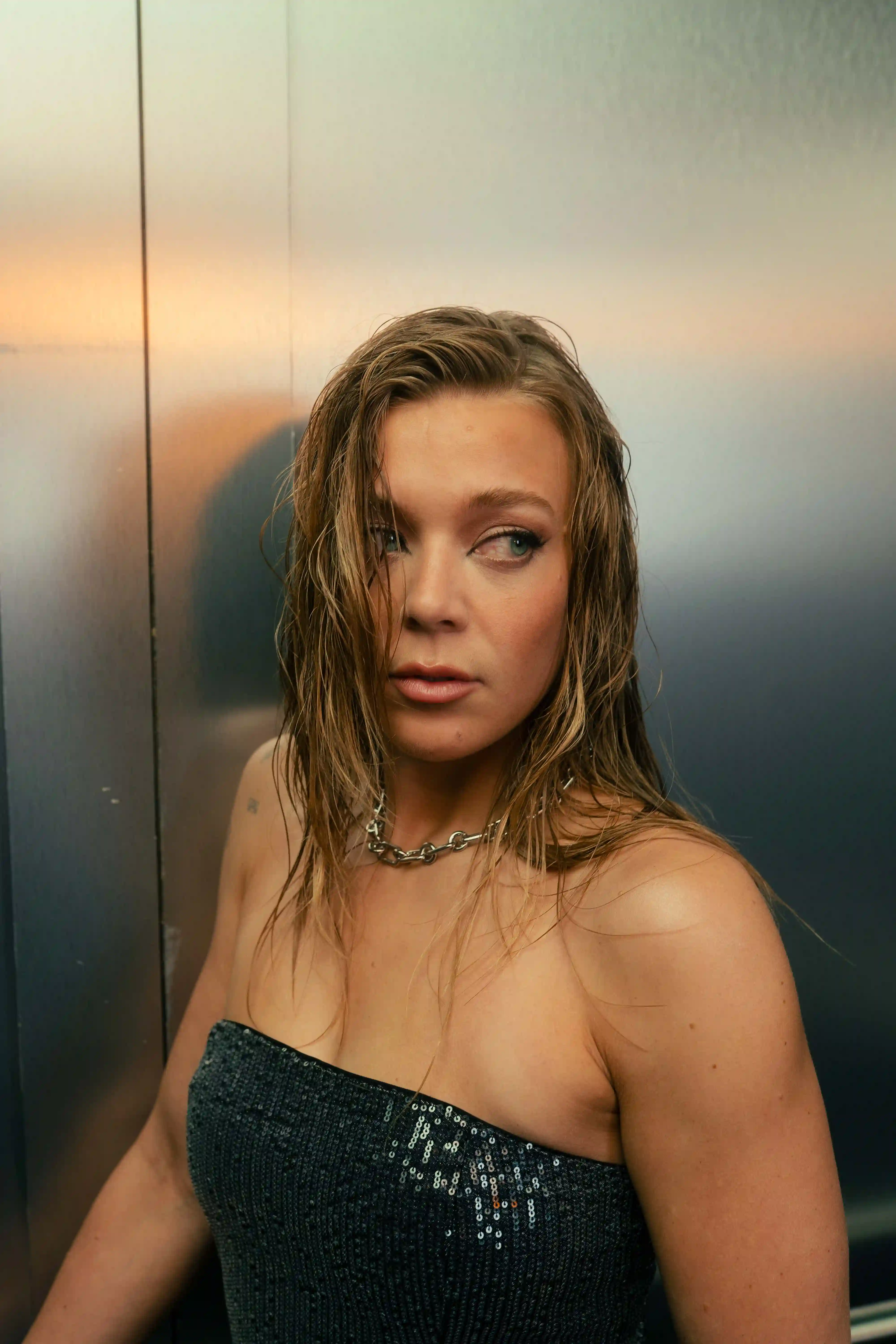 Portrait of Becky Hill in a lift